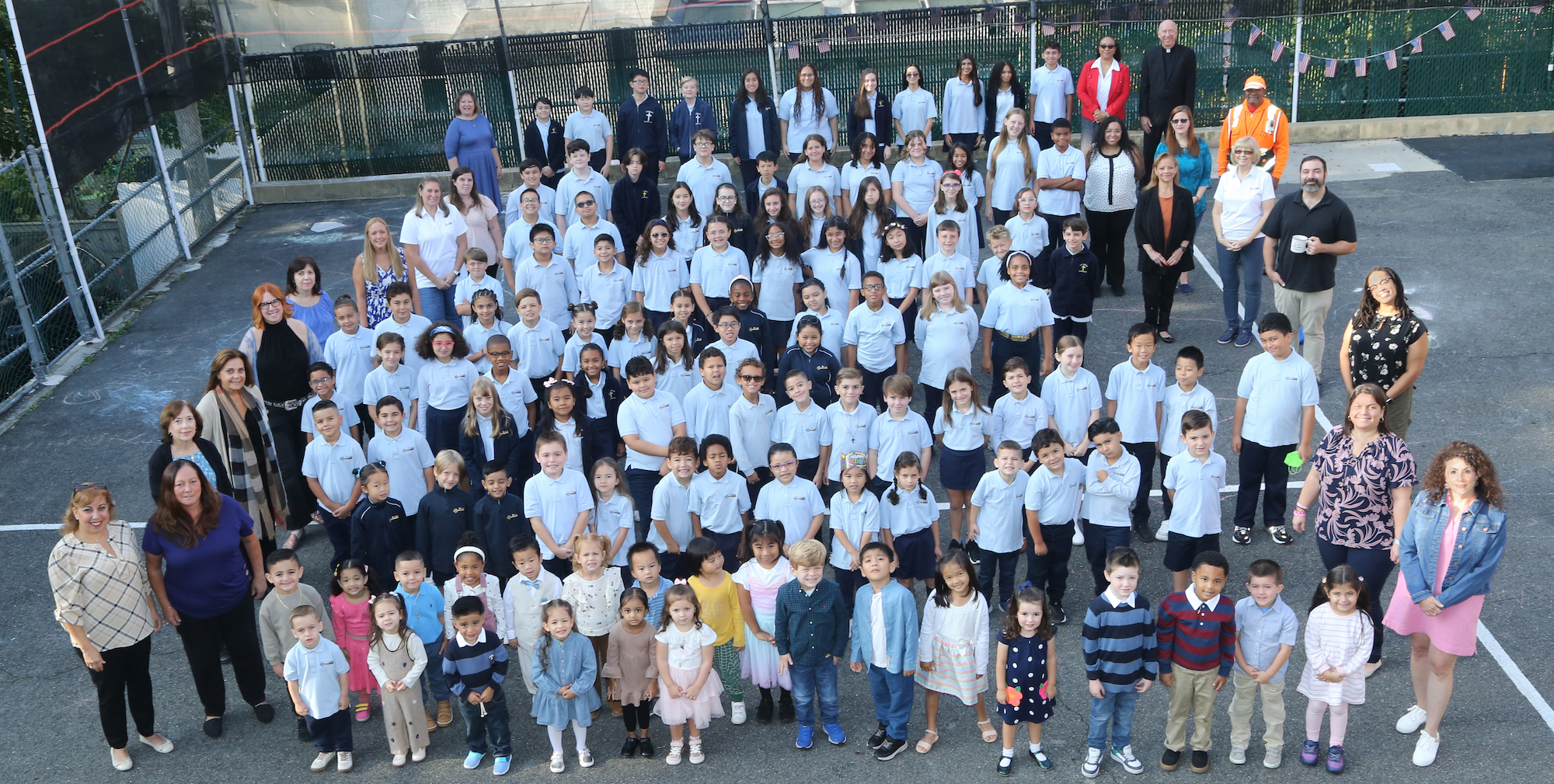 The whole Lutheran Elementary School family gathered together in the schoolyard